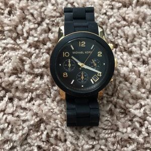 Black and gold Michael Kors watch